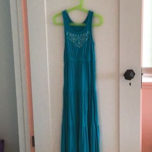 Blue tank top dress with white flowers.